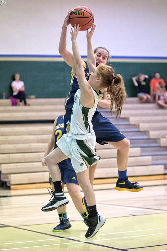 High school basketball action