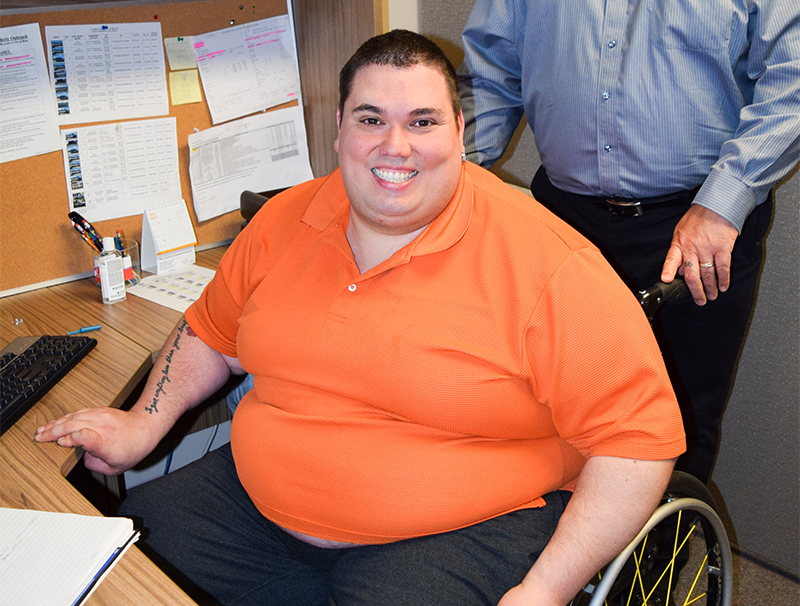 Former wheelchair athlete, 34, shakes off years of rejection to land first full-time job