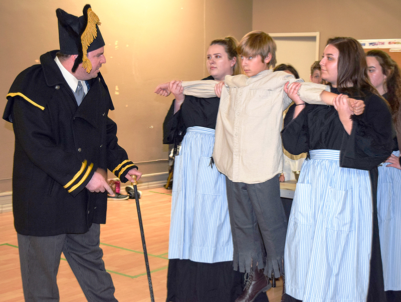Sixty-two actors in one dickens of a stage production