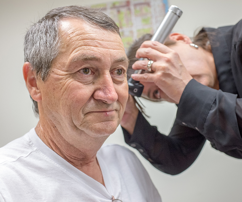 Workers with hearing loss stymied by hearing aid cuts