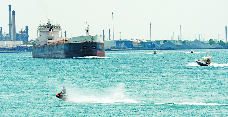Freighters, anglers clash in narrow channel