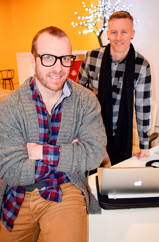 Artists-turned businessmen bring marketing firm home