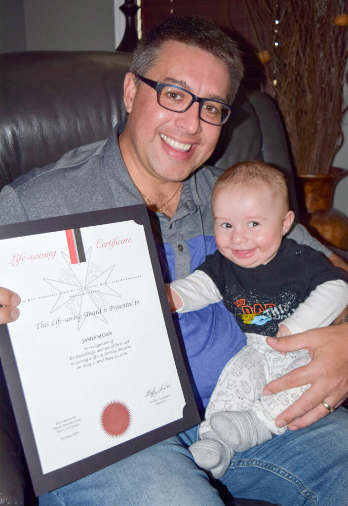 Dad who saved choking baby earns life-saving certificate