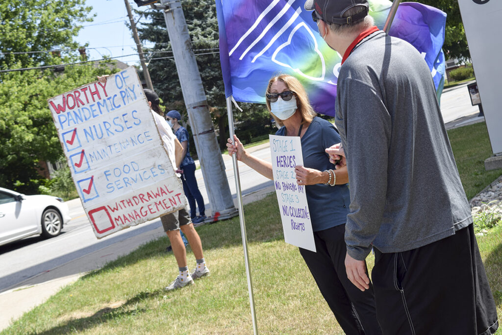 Hospital staff protest ‘disrespectful’ pandemic pay inequity