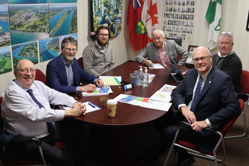 Rotary Club members discuss affordable housing options with Associate Minister of Housing